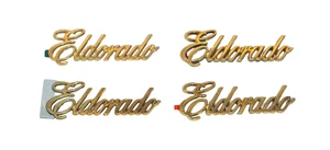 CADILLAC ELDORADO SCRIPT EMBLEM 24K GOLD PLATED USED SET OF 4 EMBLEMS - Bild 1 von 1