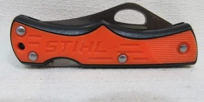 Карманный нож Stihl с простым лезвием и оранжевой черной ручкой - Изображение 1 из 4