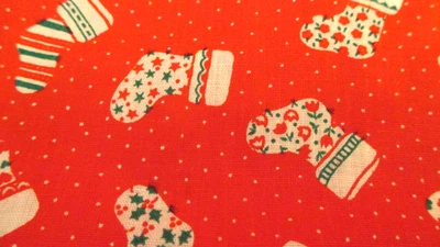100% Cotton Wamsutta OTC  Christmas Fabric Tossed Stockings on Red BTY x 44 - Image 1 of 4