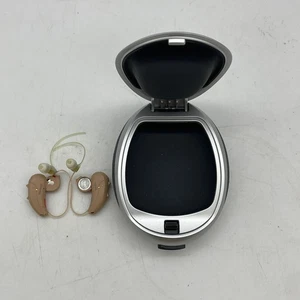 A Set Of Signia Pure CG Flesh Tone Rechargeable Hearing Aids + Case - Bild 1 von 5