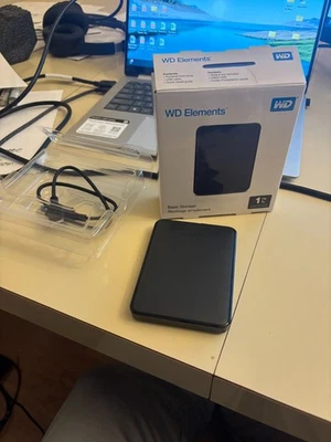 Western Digital WD Elements 1TB External USB Hard Drive WDBUZG0010BBK-0B - Image 1 of 4