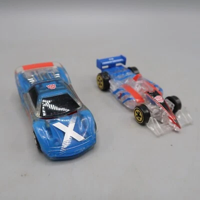Transformers 2000 MIRAGE Race car Spychanger & Crosswise robots in disguise Lot - Image 1 of 4