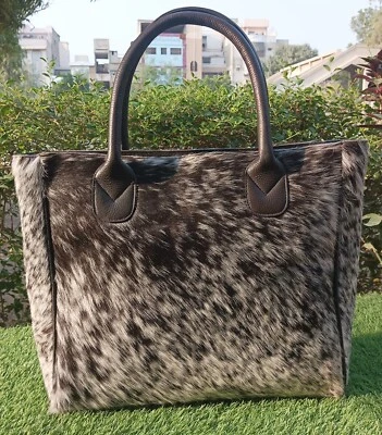 Bolso de mano para mujer de cuero genuino con estampado de animales de vaca Foto 1 de 2