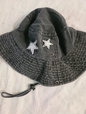 Hat with stars on it  draw string and can snap sides up  - Image 1 of 4