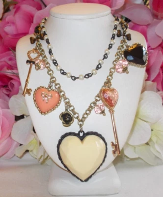 BETSEY JOHNSON LOVELY  VINTAGE HEARTS AND KEYS LUCITE TWO LAYER CHARM NECKLACE - Image 1 of 4