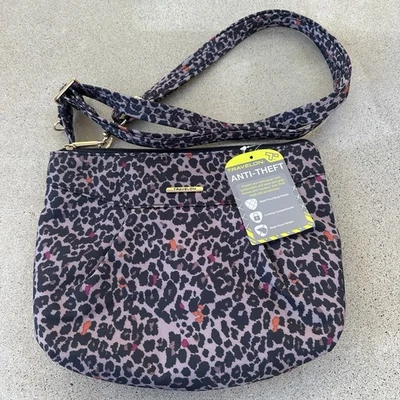 NUEVO CON ETIQUETAS Travelon Antirrobo IMPRESIÓN ANIMAL Bandolera Bolso de Hombro Cartera RFID Viaje Foto 1 de 4