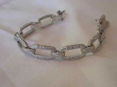 JUDITH RIPKA SOLID STERLING SILVER 7 1/2" BRACELET WITH CZ STONES - Image 1 of 4