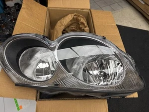 Headlight Headlamp Passenger Side Right RH NOS for 99-04 Chrysler 300M 4780012 - Picture 1 of 9