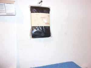 NUOVISSIMO COLLANT DONNA NERO SENZA CONFINI DESIGN A POIS TRASPARENTI SU OPACO - Foto 1 di 4