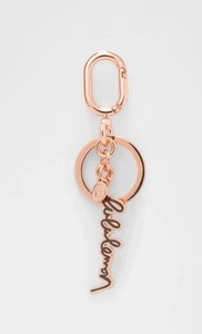 Lululemon Schlüsselanhänger Metallschrift Rosegold & Gute Nacht Pflaume - Bild 1 von 6