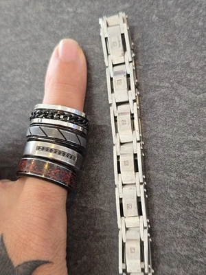 Triton & Stainless Steel Rings Bracelet Lot - Image 1 of 4