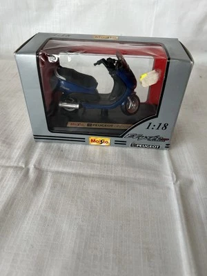 Moto Maisto Peugeot Elyseo 125 Azul 1/18 Foto 1 de 4