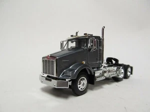 DCP / FIRST GEAR 1/64 SCALE T-800 KENWORTH DAY CAB, GUN METAL GRAY, RED ENGINE - Picture 1 of 4