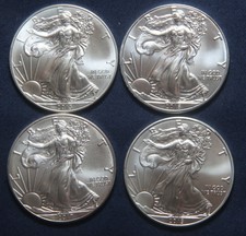 FOUR DIFFERENT SILVER AMERICAN EAGLES  1 OZ BULLION   LOT 190934