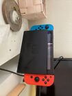Nintendo Switch Console Blue And Red With 4 Games.