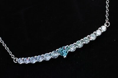 Collana tennis in argento 925 con zirconi AAA  con cuore azzurro centrale - Immagine 1 di 4