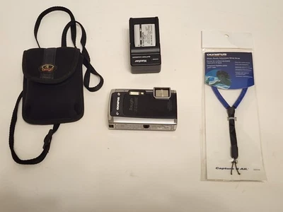 Cámara resistente a la intemperie Olympus Tough TG-610 14 MP 5x zoom negra/plateada batería de 8 GBSD Foto 1 de 3