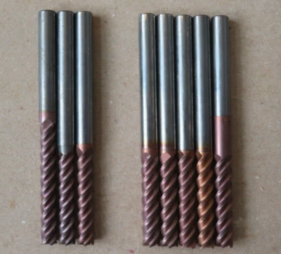 LIGERAMENTE USADO Lote de (8) BQT (EE. UU.) 9/32" y 5/16* x 4" Carburo 4-Flauta End Mill Foto 1 de 4