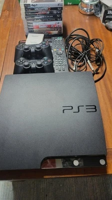 Lote de paquete de consola y juegos Playstation 3 Ps3 con control remoto y 2 mandos OEM Foto 1 de 4