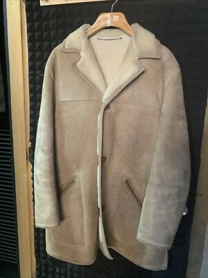 Hermoso abrigo vintage de piel de oveja tostado de Paul Stuart con bolsillos  Foto 1 de 4