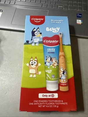 NUEVO Paquete de regalo sellado COLGATE BLUEY cepillo de dientes eléctrico y pasta de dientes de frutas con burbujas Foto 1 de 2