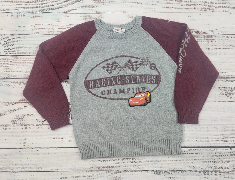 Suéter Tejido Vintage Y2K Disney Store Lightning McQueen “Campeón de la Serie de Carreras” Foto 1 de 4