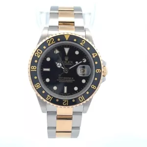 Rolex GMT Master II Two-Tone Black Dial Black Bezel 16713 - Picture 1 of 5