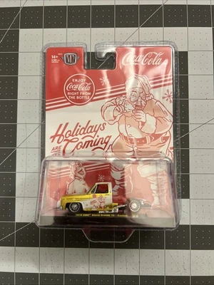 2025 M2 Machines Coke Christmas Gold 1976 GMC SIERRA GRANDE 15 CUSTOM SquareBody - Image 1 of 2
