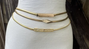Lot of 3 Vtg Skinny  Gold Tone Stretch Snake Belts w/Different Buckles - Picture 1 of 18