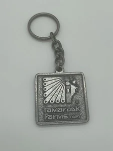 Llavero de peltre colonial antiguo Tamarack Farms Dairy - Imagen 1 de 3