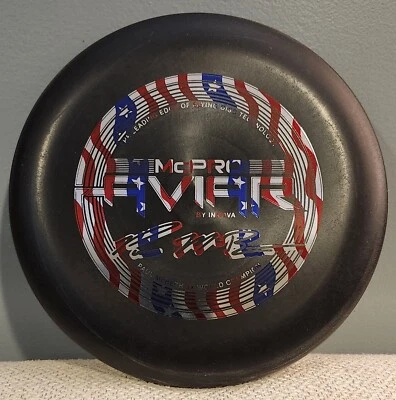 Innova 2015 Paul McBeth 3X McPro Aviar 175g Black Flag Circle Stamp - Image 1 of 3