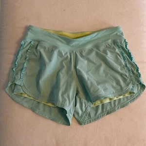 Ivivva Lululemon Girls Light Mint Green Running Athletic Shorts Size 14 Ruffle - Picture 1 of 8