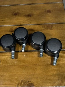 4- 2" Replacement Caster Wheels w/ 7/16" x 7/8" grip ring stem - Picture 1 of 8