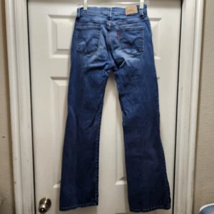 Levi’s Jeans 548 Damen 4 Medium Perfect Slimming Flare Dark Wash 4M - Bild 1 von 10