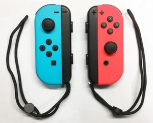 Genuine Nintendo Switch - Joy-Con (L/R)- Neon Blue (L) Neon Red (R) - UD - Picture 1 of 3