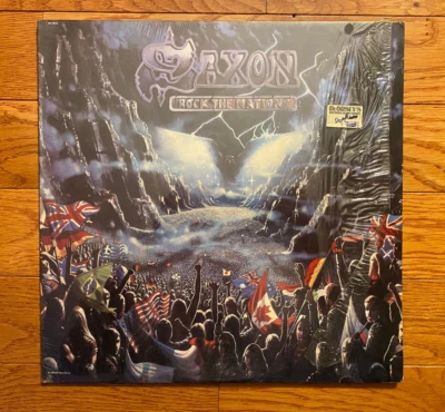 Saxon  Rock the Nations LP Capitol ST-12519 1986 Press Shrinkwrap Elton John VG+ - Image 1 of 4
