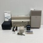Commodore 64 System Lot Untested w/ Cables Disc Drive Floppys Cartridges Etc
