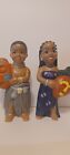 Mid Century African Boy and Girl Children Holding African Masks  Tropical Decor 