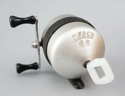 Carrete Spincast ZEBCO MODELO 66 antiguo vintage - acabado plateado y negro Foto 1 de 4