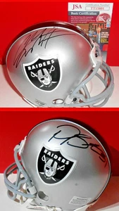 CHARLES WOODSON & PHILIP BUCHANON SIGNED AUTOGRAPH RAIDERS MINI HELMET JSA CERT - Picture 1 of 6