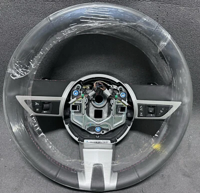 Nuevo volante de cuero Chevrolet Camaro 2010-2011 OEM con costuras rojas Foto 1 de 4