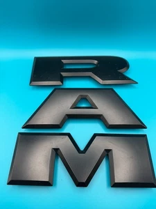 DAMAGE OEM 2019 - 2025 DODGE RAM 1500 REAR GATE BLACK EMBLEM LOGO BADGE - Picture 1 of 12