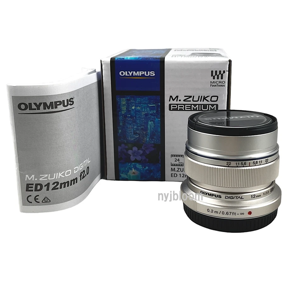 New OLYMPUS M.Zuiko Digital ED 12mm f/2.0 Lens - SILVER - Micro Four Thirds Moun - Image 1 of 4