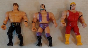 3 Generic 1990s Wrestling Figure Lot WWE WWF IWC Mannix KO Razor Hogan Michaels - Picture 1 of 2