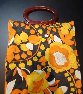Cartera vintage años 60/70 convertida en bolso de mano con asas Lucite y patrón de flores - Imagen 1 de 12