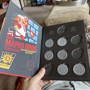 Super Mario Bros Coin Collector’s Album And Album Coin ThinkGeek Nintendo - Picture 1 of 4