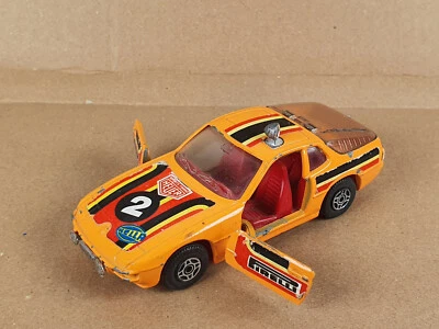 Corgi Toys Porsche 924 Rally 1979 1:36 orange pirelly rennwagen hella 2 heuer - Bild 1 von 4