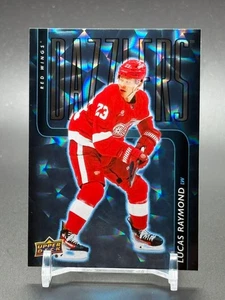 2025-26 Upper Deck Series 1 Blue Dazzlers DZ-30 LUCAS RAYMOND Detroit Red Wings - Picture 1 of 2