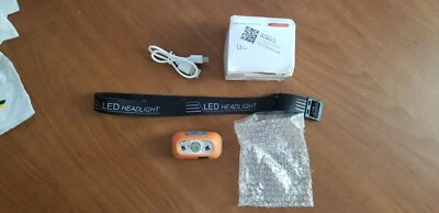 RECHARGEABLE HEADLAMP - ORANGE - SENSOR ACTIVATED OFF/ON - NEW IN DISTRESSED BOX - Image 1 of 4