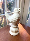 Figurine oiseau poterie craquelée blanc assis sur perchoir